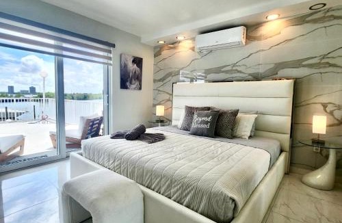 North Bay Village Apartment | Luxurious remodeled direct Waterfront apartment with Miami skyline view and outdoor terrace Free parking 5min drive to Miami Beach