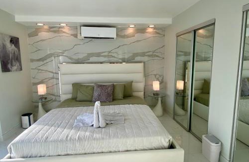 North Bay Village Apartment | Luxurious remodeled direct Waterfront apartment with Miami skyline view and outdoor terrace Free parking 5min drive to Miami Beach