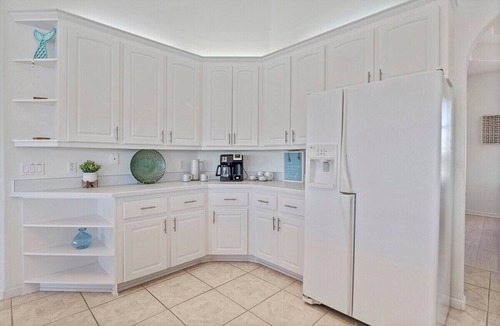 Palm Harbor House | Luxury 4-Bedroom Canal Home with Pool