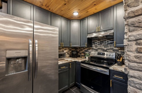 Caton Cabin | Luxury Cabin with Indoor Pool, Theater, Hot Tub & Fire Pit Sleeps 20