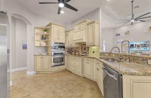 Cape Harbour House | Luxury Canal-Front Escape - 4Bed Pool Home Minutes from Cape Harbour Nightlife