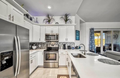 Mariner House | Luxury Canal-Front Retreat with Heated Saltwater Pool - Sleeps 8!