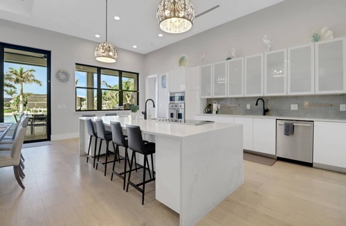 Pelican House | Luxury Cape Coral Estate | Stunning Waterfront | Saltwater Lagoon Pool, Spa & Sprawling Sun Deck