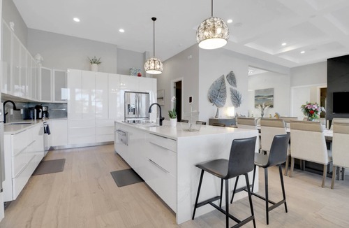 Pelican House | Luxury Cape Coral Estate | Stunning Waterfront | Saltwater Lagoon Pool, Spa & Sprawling Sun Deck