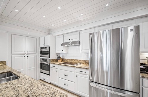 Ormond-by-the-Sea Condo | Luxury direct oceanfront corner penthouse with heated pool and garage parking