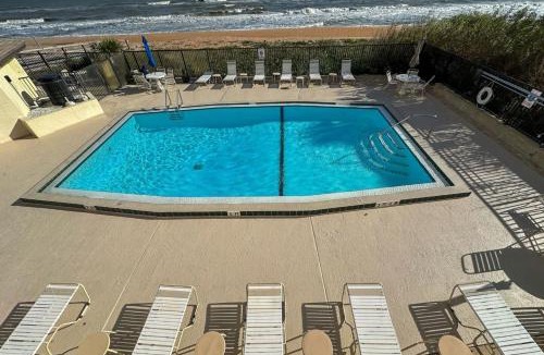Ormond-by-the-Sea House | Luxury direct oceanfront corner with a large private balcony, heated pool and garage