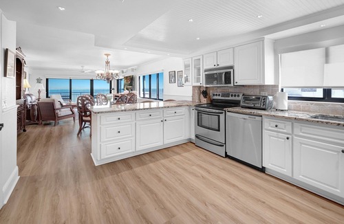 New Smyrna Beach Condo | Luxury, direct oceanfront top-floor corner with wrap-around balcony and heated pool