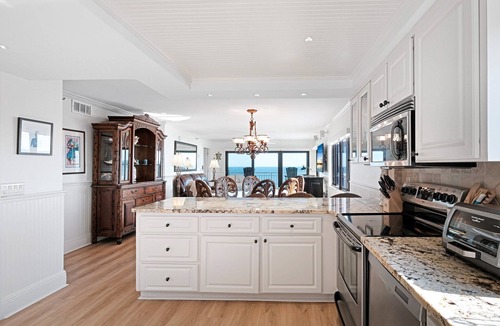 New Smyrna Beach Condo | Luxury, direct oceanfront top-floor corner with wrap-around balcony and heated pool