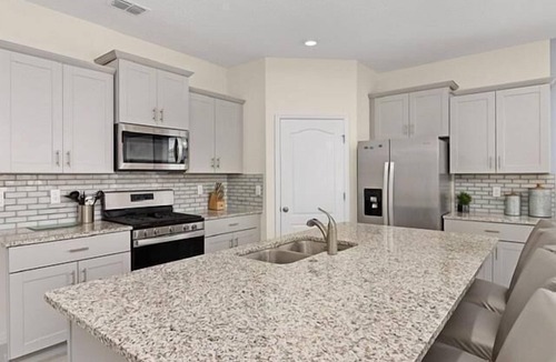 Sunridge Woods Villa | Luxury Family Villa with Themed Rooms, Pool, Spa & Games Room Near Disney