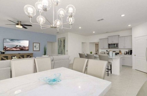 Sunridge Woods Villa | Luxury Family Villa with Themed Rooms, Pool, Spa & Games Room Near Disney