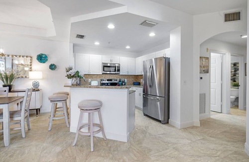 Pelican Condo | Luxury Ground Floor Condo - Pool - Fitness Center