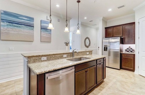 American Beach Condo | Luxury ground level condo. Golf cart, bikes, included.