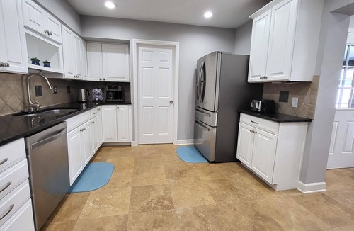 Disston Heights House | Luxury heated pool and hot tub vacation house