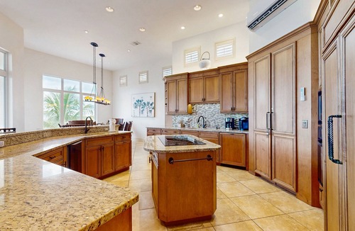 Siesta Isle House | Luxury home boasting waterfront views with pool and golf simulator