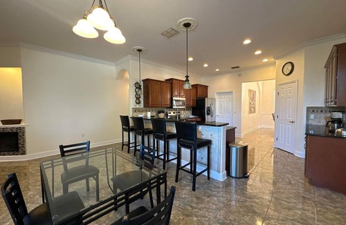 Lakeland House | Luxury home with heated pool & hottub! Close to golf, beach, & amusement parks.