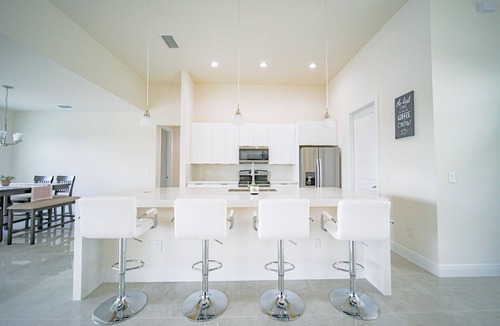Diplomat House | Luxury Living at Cape Coral-Heated Pool 3 Bedroom-3 Bathroom-Fresh Water Canal.
