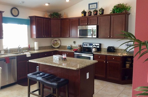 Gilchrist House | Luxury & Relaxation at This AMAZING Pool home with Golf Cart & BBQ Grill!