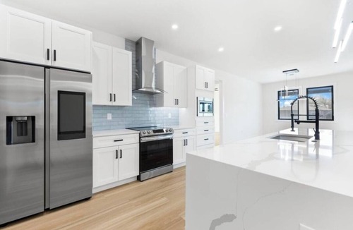 South Gulf Cove House | Luxury Relaxing Waterfront House - Heated Pool - 4BD - Family and Pets Friendly