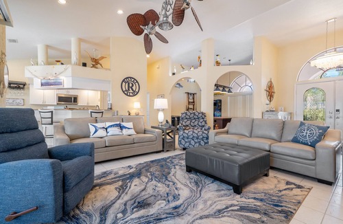 Burnt Store Isles House | Luxury Tropical long waterfront view w/bikes,kayaks,golf clubs,beach gear incl.