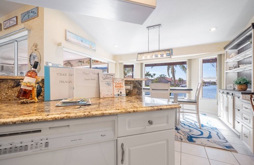 Burnt Store Isles House | Luxury Tropical long waterfront view w/bikes,kayaks,golf clubs,beach gear incl.