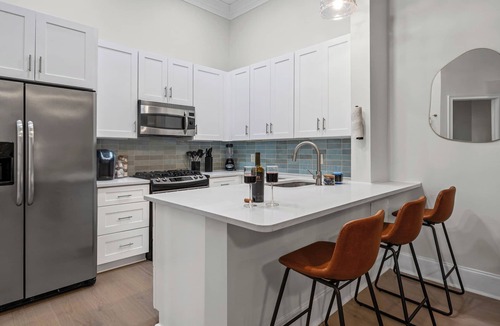 Fourth Ward Condo | Luxury Uptown 2BR Condo Pool Patio Walk to Stadiums & Dining
