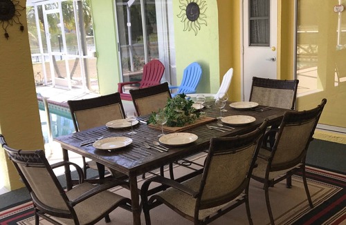 South Gulf Cove House | LUXURY WATERFRONT! WARM PRIVATE POOL! MIN TO BEACHES! WIFI! GRILL! BABY SUPPLIES