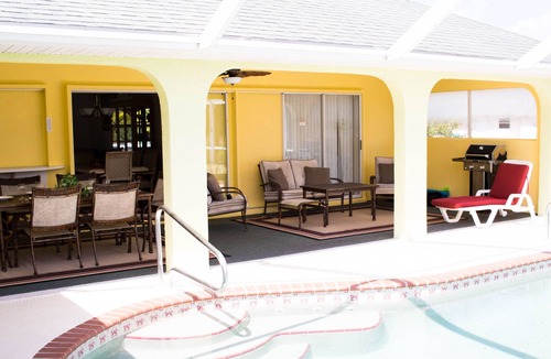 South Gulf Cove House | LUXURY WATERFRONT! WARM PRIVATE POOL! MIN TO BEACHES! WIFI! GRILL! BABY SUPPLIES