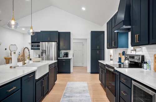 Palm Harbor House | Luxury Waterfront Escape – Private Dock, Heated Pool & Game Room! Pet-Friendly!