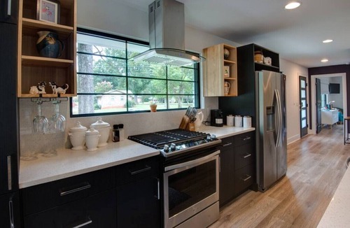 Charlotte House | Main House · Modern design meets comfort w/deck & chefs kitchen