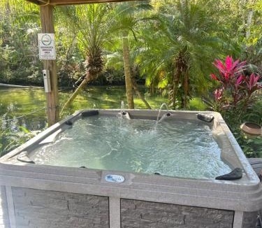 Weeki Wachee Gardens Villa | Main River Retreat hot tub, canoe with trolling motor
