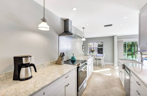 Shell Harbor House | Manatee Cove - Gorgeous Canal Front Home with Heated Pool and Deeded Beach Access!