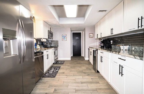 Hampton Homes House | Marlin on Merritt Pool House featuring Private Game Room, Mini Golf & Fire Pit!