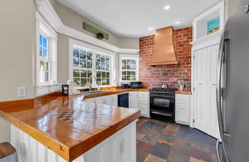 Cherry Grove Beach House | Marsh Front Beach Home-4BR-Pool, Putting Green, Game Room-Pet Friendly-Sleeps 15