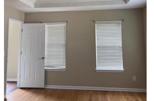 Lithonia House | Master bedroom with full bathroom