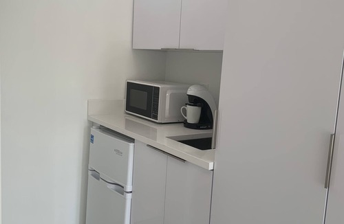 South Middle River House | Men Only Clothing Optional Guesthouse near Wilton Manors