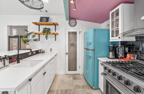 West Palm Beach House | Mid-Century Gem: Pool, Privacy, and Palm Trees