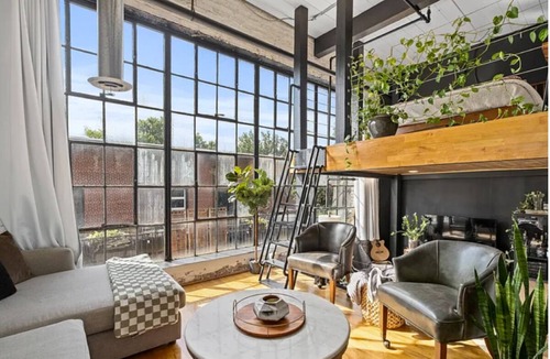 Castleberry Hill Condo | Midcentury Modern loft in Castleberry Hill with patio, parking & sleek updates.