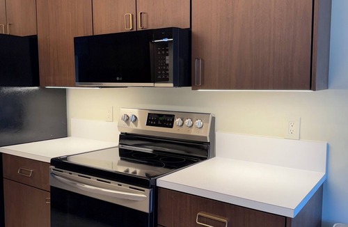 Hypoluxo Condo | Midterm Rental of art deco styled condo with Intracoastal view + access.