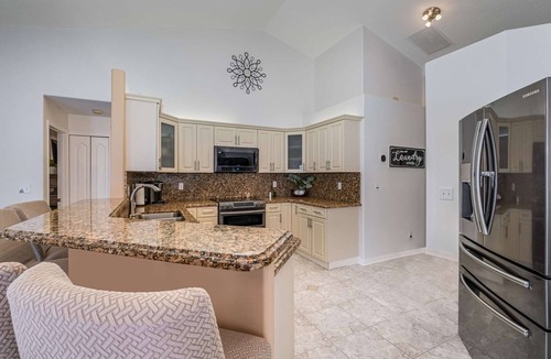 Interchange Square House | Milly2 · Elegant 4BR Pool Sanctuary · Ideal for Work/Play!
