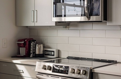 Hadley - Washington Condo | Modern 1BR w/Massive Deck & City Views