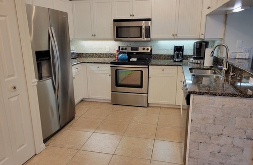 Fountain Lakes Condo | Modern 2 bedroom/2 bath condo with pool, and free golf in delightful Estero.