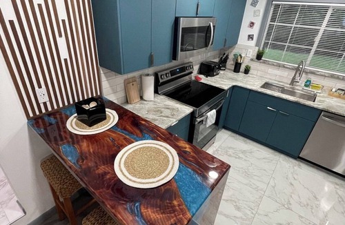Crystal River House | Modern 2-bedroom waterfront home near Manatee Haven with kayaks