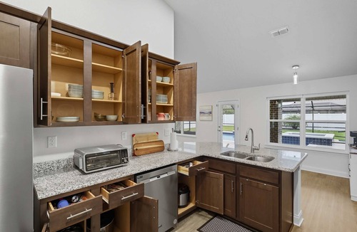 Palm Harbor House | Modern 4BR Retreat Near Beach + Heated Pool