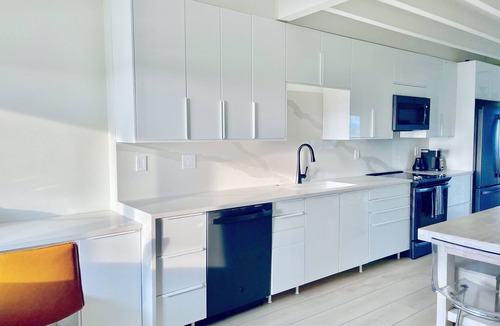 Placida Condo | MODERN BEACHFRONT RETREAT: Stunning Views+ Heated Pool+ Ferry Access+ Parking!