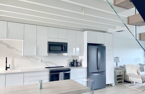 Placida Condo | MODERN BEACHFRONT RETREAT: Stunning Views+ Heated Pool+ Ferry Access+ Parking!