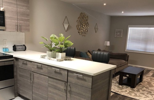 Loring Heights Condo | Modern chic living with a splash of AQUA