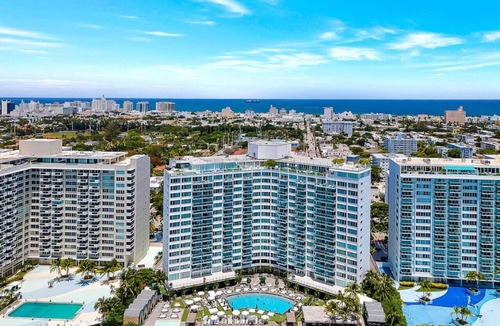 West Avenue Condo | Modern City Studio on High Floor with Ocean view, pool, gym, spa access