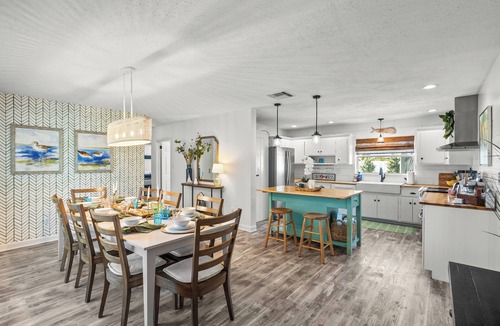 Stuart House | Modern coastal getaway with hot tub, putting green and private backyard oasis.