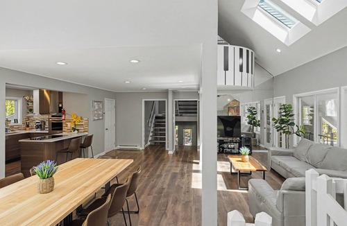Bushkill House | Modern Creek-front House with Rooftop and Volleyball court