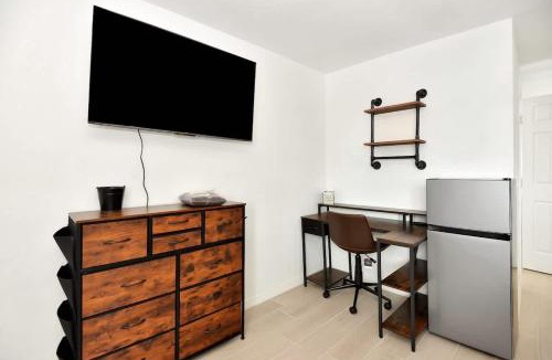 Daytona Beach Shores Apartment | Modern King Suite #10 Steps to Daytona Beach